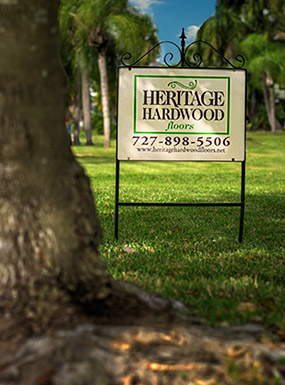 Heritage Hardwood Floors sign in a client's yard